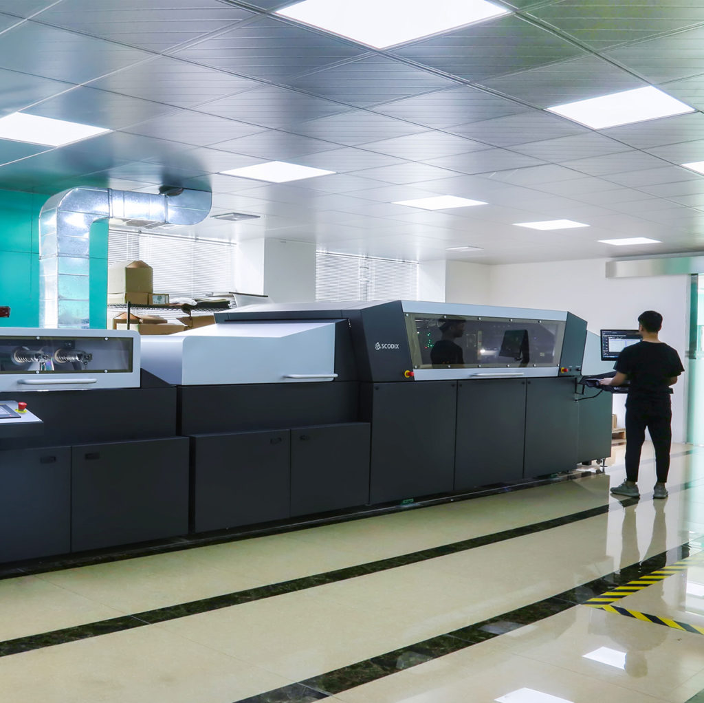 Printing and packaging production machine
