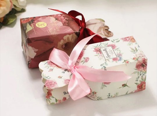 Floral printed gift boxes with ribbon closures
